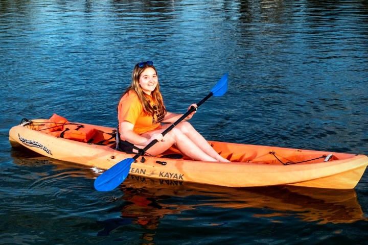 a small boat in a body of water